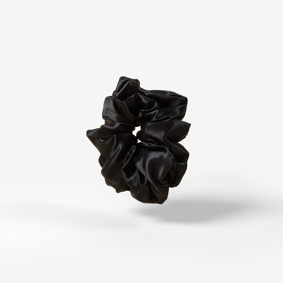 black scrunchie floating