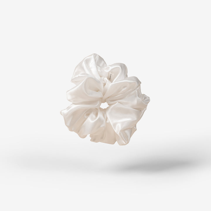 white scrunchie floating