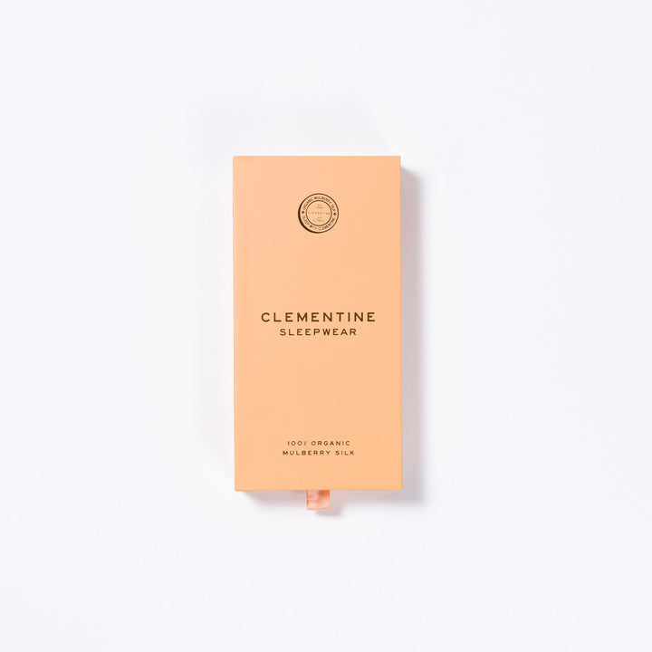 Peach gift box labeled CLEMENTINE SLEEPWEAR; also reads 100% ORGANIC MULBERRY SILK.#color_lilac-haze