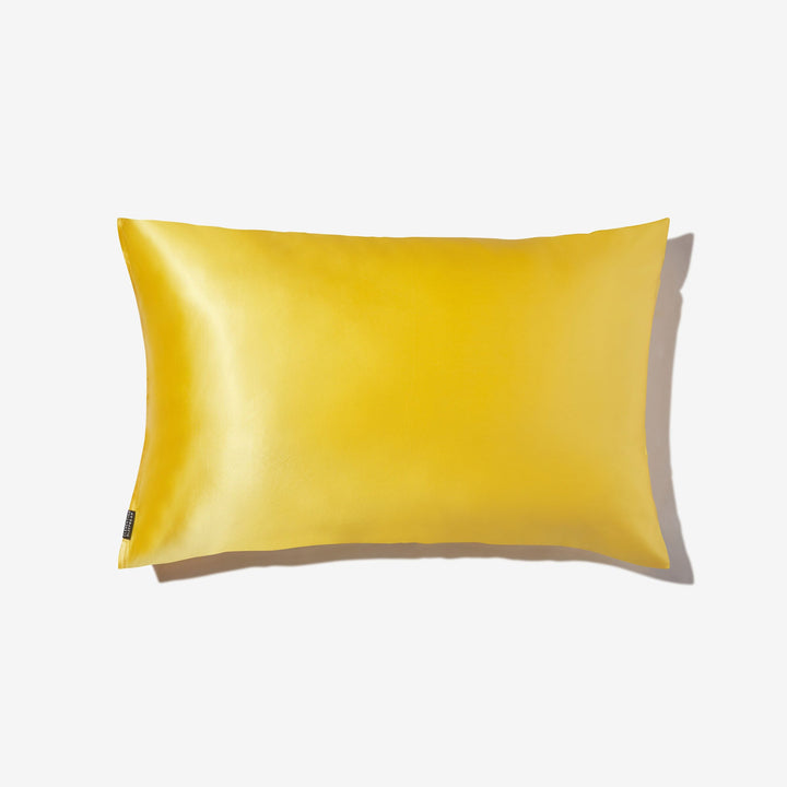 Lemon-yellow silk pillowcase on white background, rectangular standard pillow with small black care tag. - New color#color_lemon