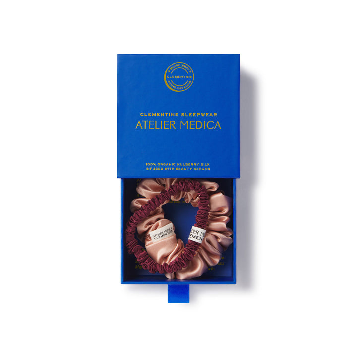 ATELIER MEDICA scrunchie with silk infused with beauty serums like hyaluronic acid, in box with drawer open