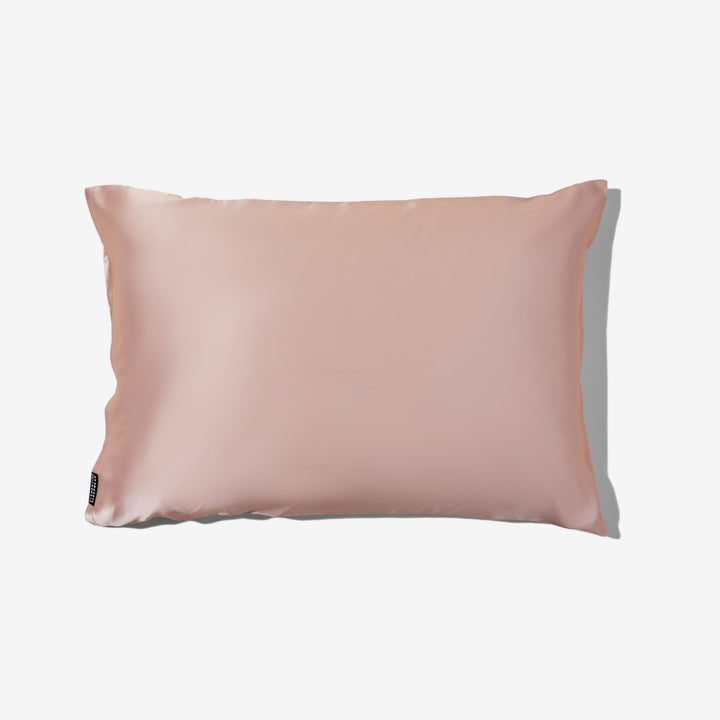 Pink silk pillowcase with silk sheen on white background - luxury silk pillowcase pink#color_pink-sherbert