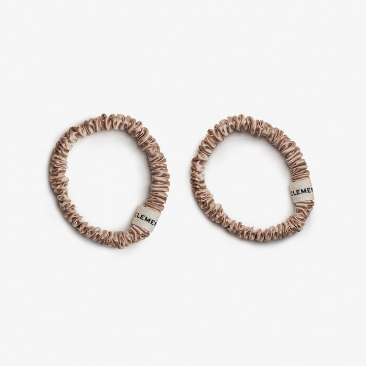 two champagne gold skinnie scrunchies