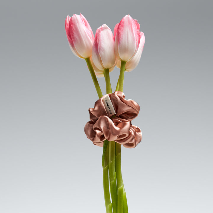 organic peach scrunchie on flower