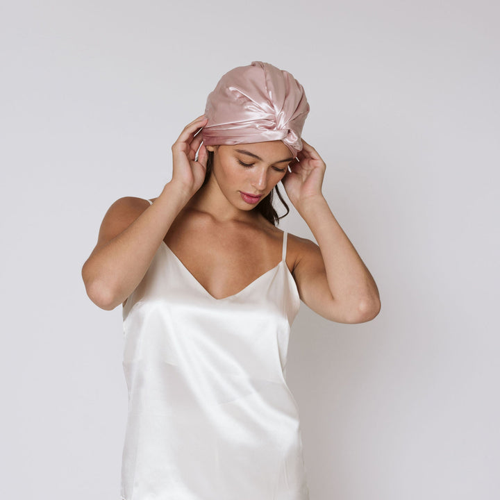 hands touching pink hair bonnet#color_pink-sherbert