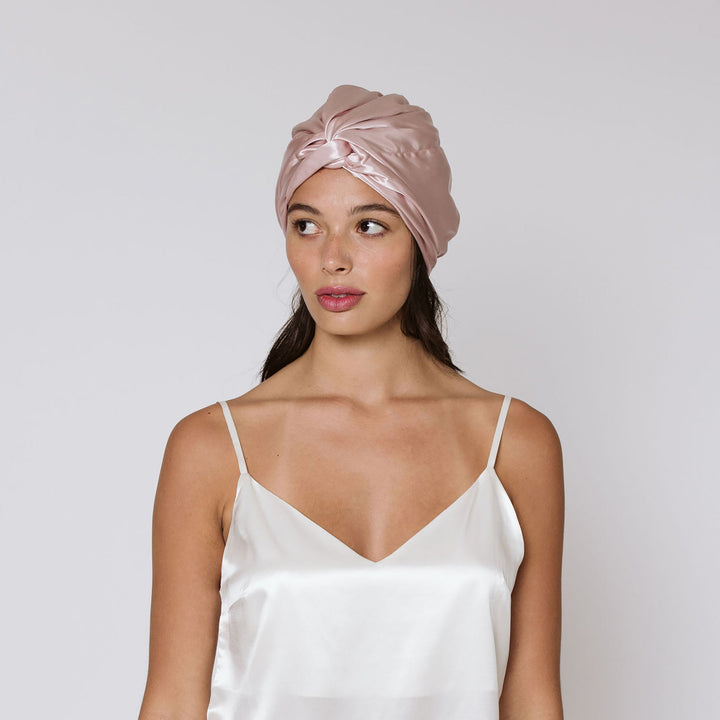 pink organic hair bonnet on brunette model#color_pink-sherbert