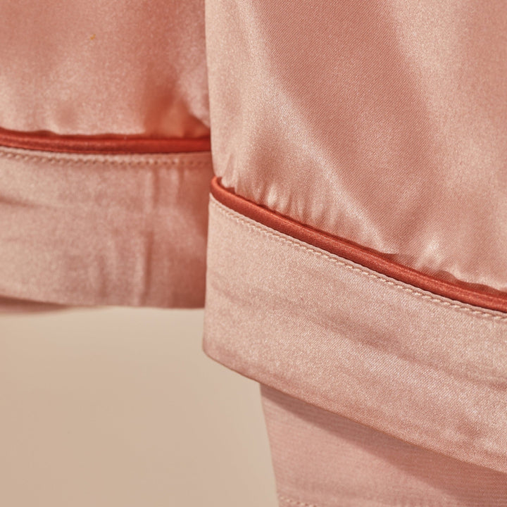 organic silk pajama pants stitch detail#color_clementine-peach-and-dusk
